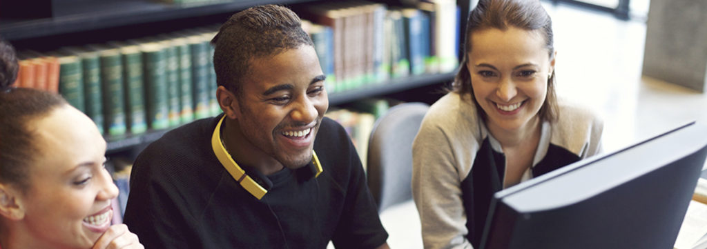 A group of students navigate the GoGovernment.org website.